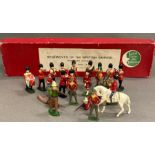 A selectin of vintage toy soldiers and cowboys