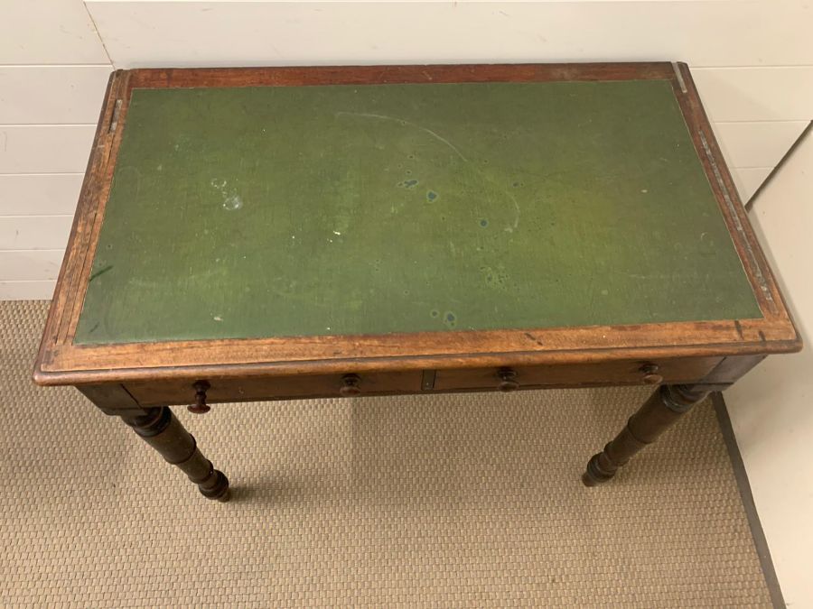 A mahogany writing table with leather top on turned legs (H7cm W91cm D52cm) - Image 6 of 6