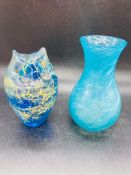A Medina glass cat and a studio glass vase.