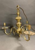 A three arm brass celling light or chandelier