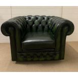 A square button back green Chesterfield club chair