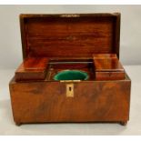 A mahogany tea caddy with inserts to sides (missing its glass liner)