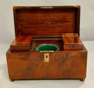 A mahogany tea caddy with inserts to sides (missing its glass liner)