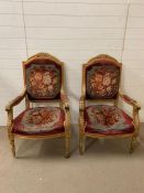 A pair of Louis XVI style carved giltwood open chairs