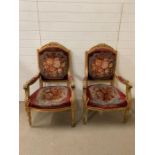 A pair of Louis XVI style carved giltwood open chairs