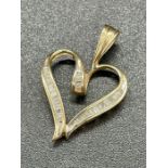 A 10ct yellow gold heart shaped pendant (2.1g)