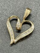 A 10ct yellow gold heart shaped pendant (2.1g)