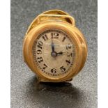 An 18ct gold cased watch, no strap, and not working (8.7g Total Weight)