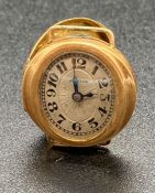 An 18ct gold cased watch, no strap, and not working (8.7g Total Weight)