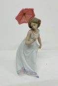 A Boxed Lladro porcelain figurine "Afternoon Promenade" No 7636