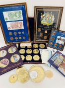 A selection of collectable coins, medallions, coin sets and framed sets.