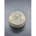 Silver pill box with cherub decoration, hallmarked for Birmingham 1902