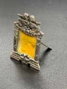 A miniature silver photo frame, marked 925.