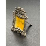 A miniature silver photo frame, marked 925.