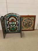 A framed tapestry screen and a lead glass fire screen a/f