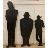 Three wooden cut outs of James Bond characters (Tallest 240cm)