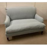 A two seater duck egg blue sofa with loose covers from OKA (H80cm W123cm D70cm)