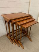 A set of four nesting tables