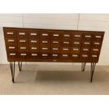 A Mid Century teak library card cabinet on metal hair pin legs by Serota London (H92cm W146cm