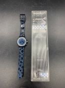 A Vintage Swatch 'Silver Star' watch in original box