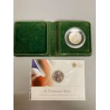 A Royal Mint A Timeless First 2013 UK £20 Fine Silver Coin and a cased commemorative 1988 Solomon