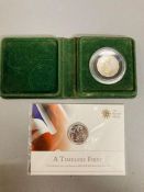 A Royal Mint A Timeless First 2013 UK £20 Fine Silver Coin and a cased commemorative 1988 Solomon