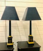 A pair of "And So To Bed" bedside lamps with gold details and black leather effect shades