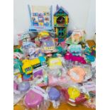 A Large selection of Polly Pocket toys and collectables