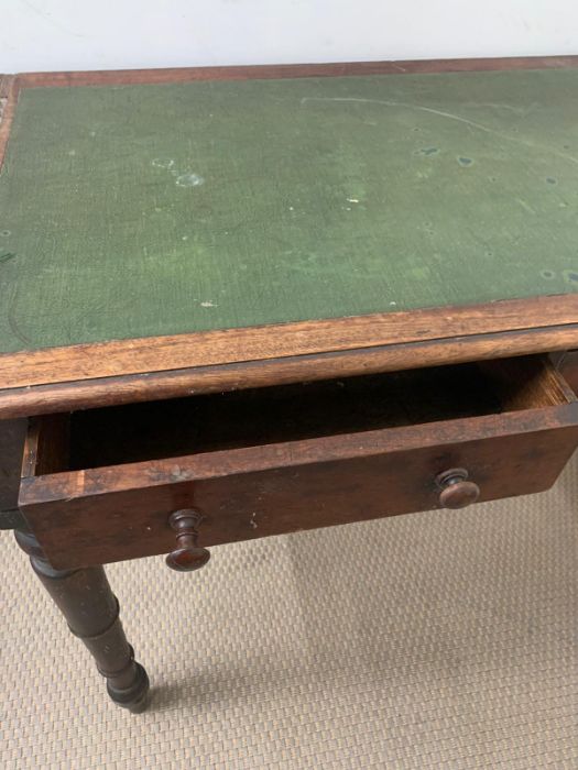 A mahogany writing table with leather top on turned legs (H7cm W91cm D52cm) - Image 4 of 6