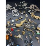 A selection of costume jewellery to include bangles, brooches, earrings etc