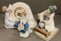 Three pieces of Lladro including a clock