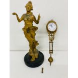 A Gilt clock in the form of a lady AF