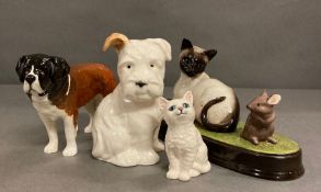 A selection of four Beswick figures to include two dogs, a cat and 'Watch It'