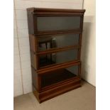 A Four Tier Globe Wernicke bookcase (H 140 cm x 87 cm)