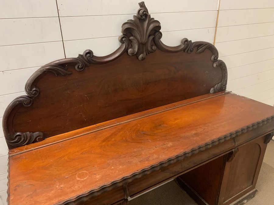 A mahogany pedestal sideboard, the raised back with scroll and foliage carving three drawers above - Image 3 of 9