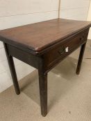 An oak folding table (H67cm W83cm D43cm)