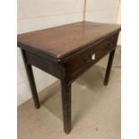 An oak folding table (H67cm W83cm D43cm)