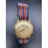 A Rotary UM 17 Jewels 9ct gold Gents watch on a fabric strap (Total Weight 22.3g)