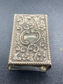 A silver matchbox cover, hallmarked for Sheffield 1923 by Henry Hobson & Sons