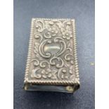 A silver matchbox cover, hallmarked for Sheffield 1923 by Henry Hobson & Sons