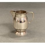 A silver milk jug (150g) hallmarked for Birmingham 1929 by William Devenport