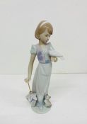 A Boxed Lladro porcelain figurine "Summer Stroll" model no 7611