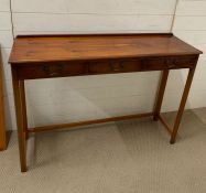 A reproduction console table (H86cm W121cm D35cm)