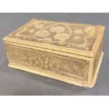 An antique ivory pocket watch box with floral carved design (10 cm wide x 6.7cm deep x 4 cm high)
