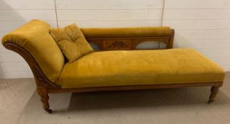 A Chaise Longue in gold velvet with a shaped back.(195 cm L x 70 cm D x 80 cm H)