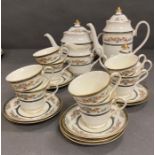 An eight place setting dinner service by Minton in the Stanwood pattern. (Please be aware that there