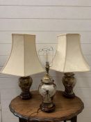 Three ginger jar style table lamps decorated with wistra and birds