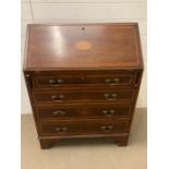 A bureau with shell decorated fall front open to drawers and writing slope AFCondition Report