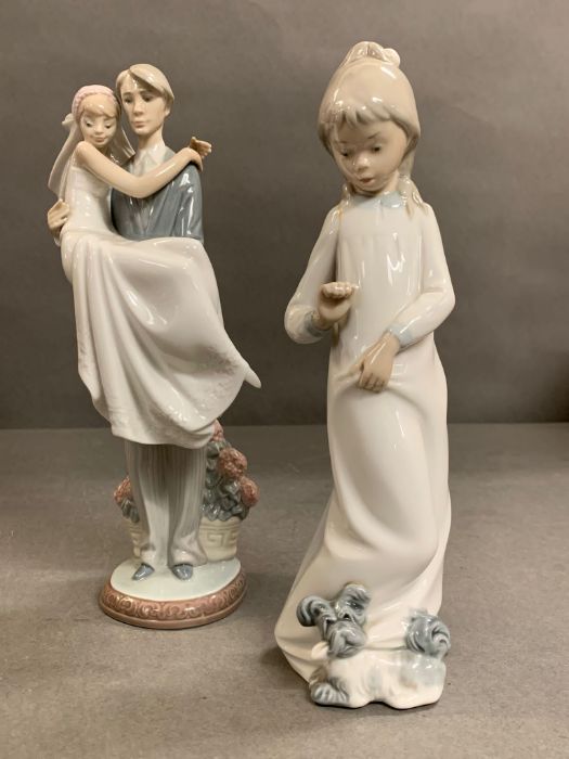 A Lladro and Nao figures