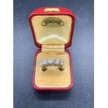A five Stone diamond ring on 18 ct yellow gold setting